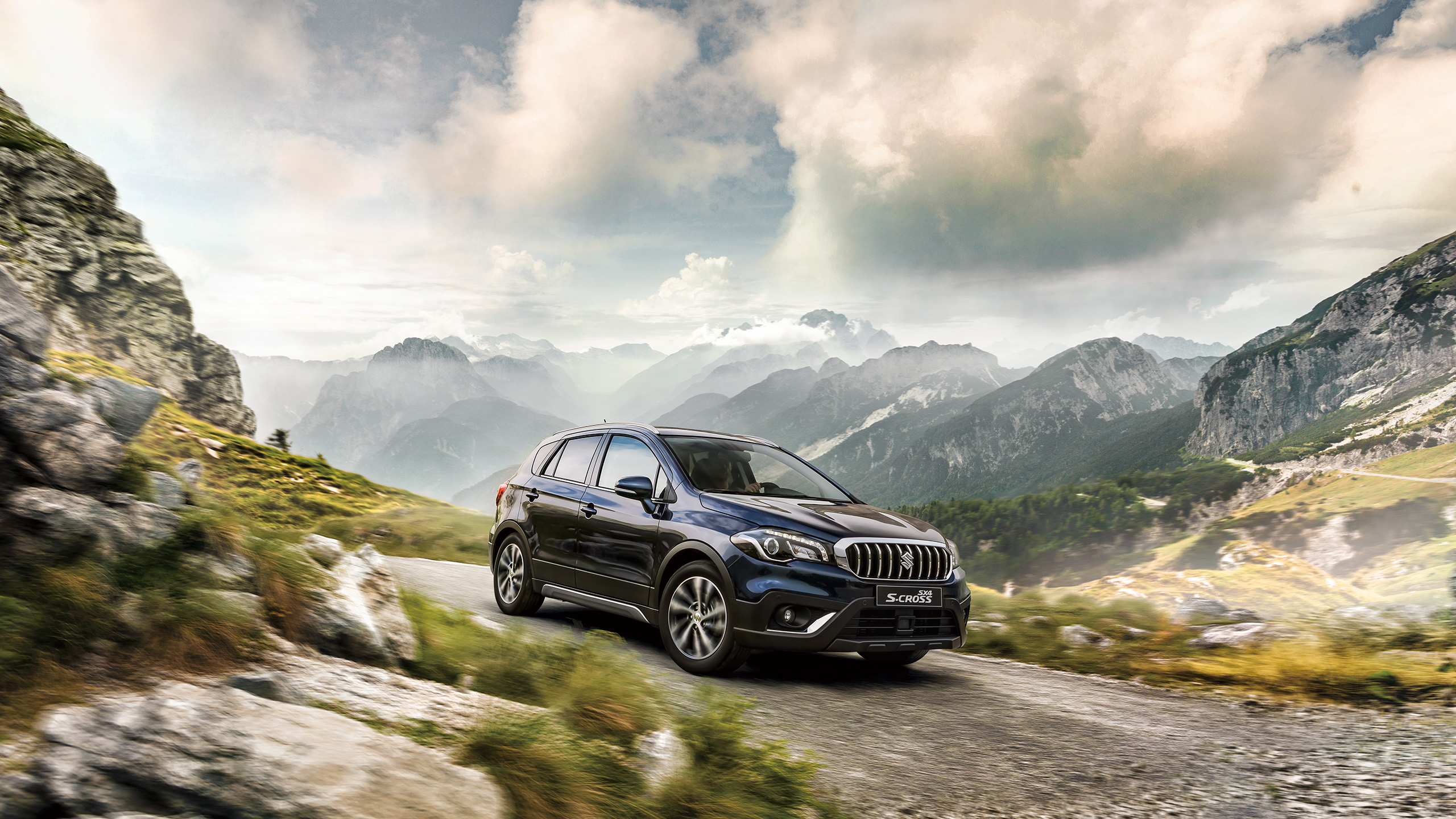 SX4-S-CROSS-driving-on-rough-road-in-mountains