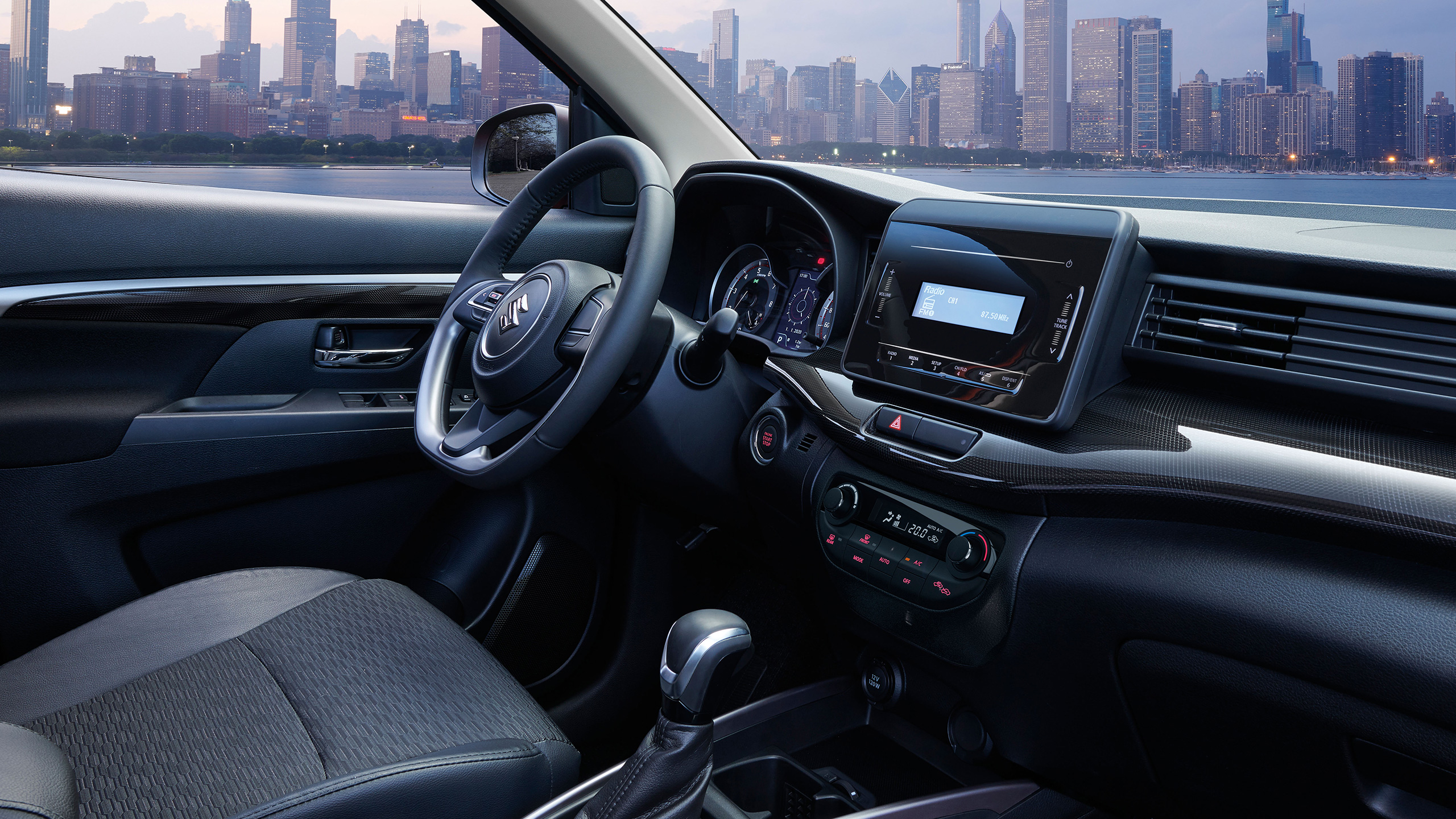 XL7-dashboard-with-cityscape-view-over-the-river-outside