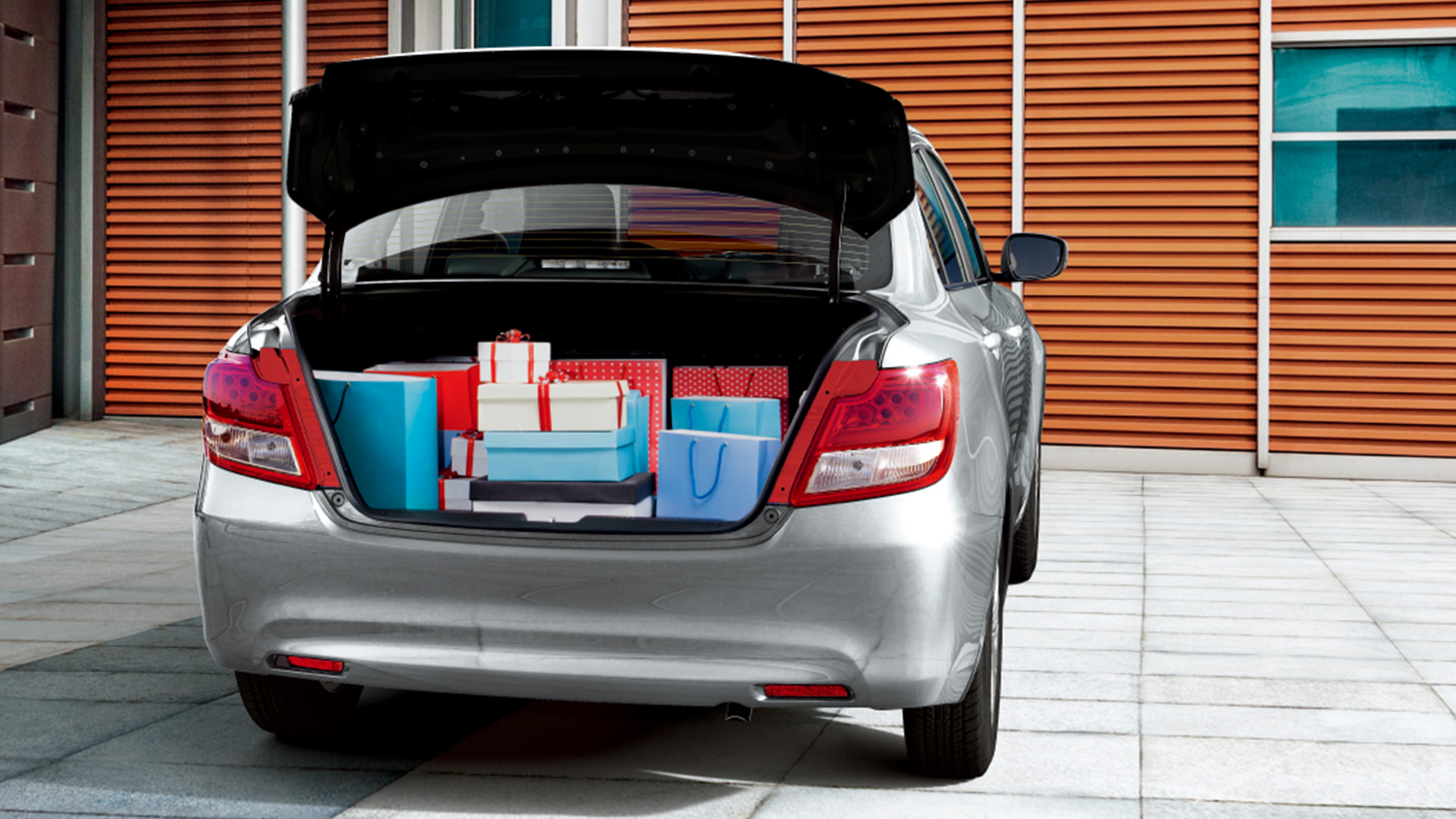 Dzire-rear-shot-with-many-gifts-in-the-boot-space