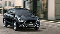 Front-shot-of-Dzire-driving-in-the-city