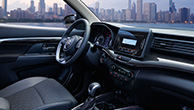XL7-dashboard-with-cityscape-view-over-the-river-outside