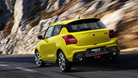 rear-shot-of-Swift-Sport-going-straight-on-mountain-road