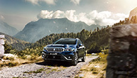 front-view-of- SX4-S-CROSS-driving-on-rough-road-in-mountain