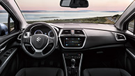 SX4-S-CROSS-interior-showing-instrument-panel-with-ocean-outside