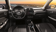 Dzire-interior-with-cityscape-outside-in-sunset